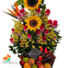 Arreglo Floral con Rosas, girasoles, heliconias y frutas frescas