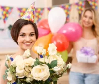 depositphotos_92853456-stock-photo-young-girl-holding-a-flower